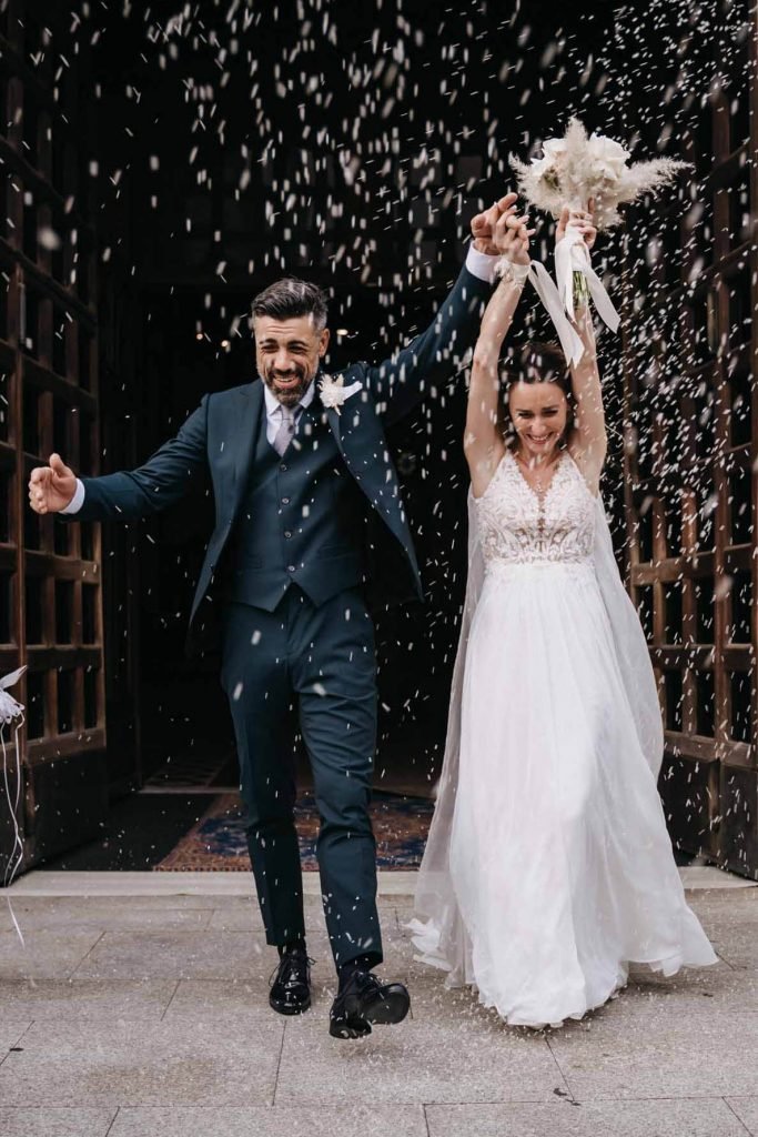 wedding couple celebrating after the ceremony