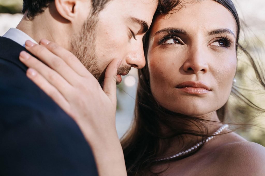 elegant married couple posing for a photo shoot romantic pose